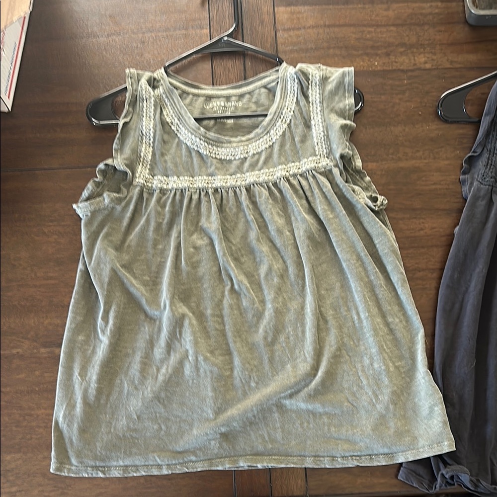 Two cute tops from Lucky. Black and olive green. Size large.